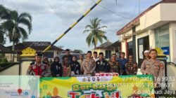 Semarak Ramadhan 1447 H, Polsek Lambu Kibang Bagikan Takjil di depan Mako Kepada Masyarakat Pengguna Jalan yang melintas